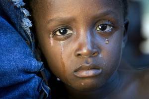 Child Receives Cholera Treatment in L'Estere, Haiti