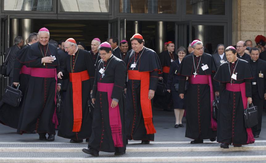 Cardinals and bishops leave a meeting of the Synod of Bishops on the new evangelization at the Vatican Oct. 9. (CNS photo/Paul Haring) (Oct. 12, 2012)