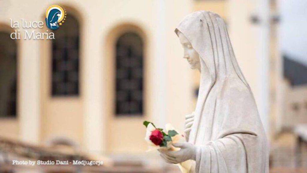 Our Lady of Medjugorje in front of the church of San Giacomo