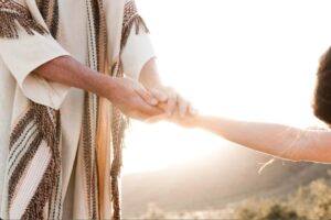 gesù tende la mano