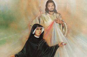 santa faustina e alle spalle gesù misericordioso