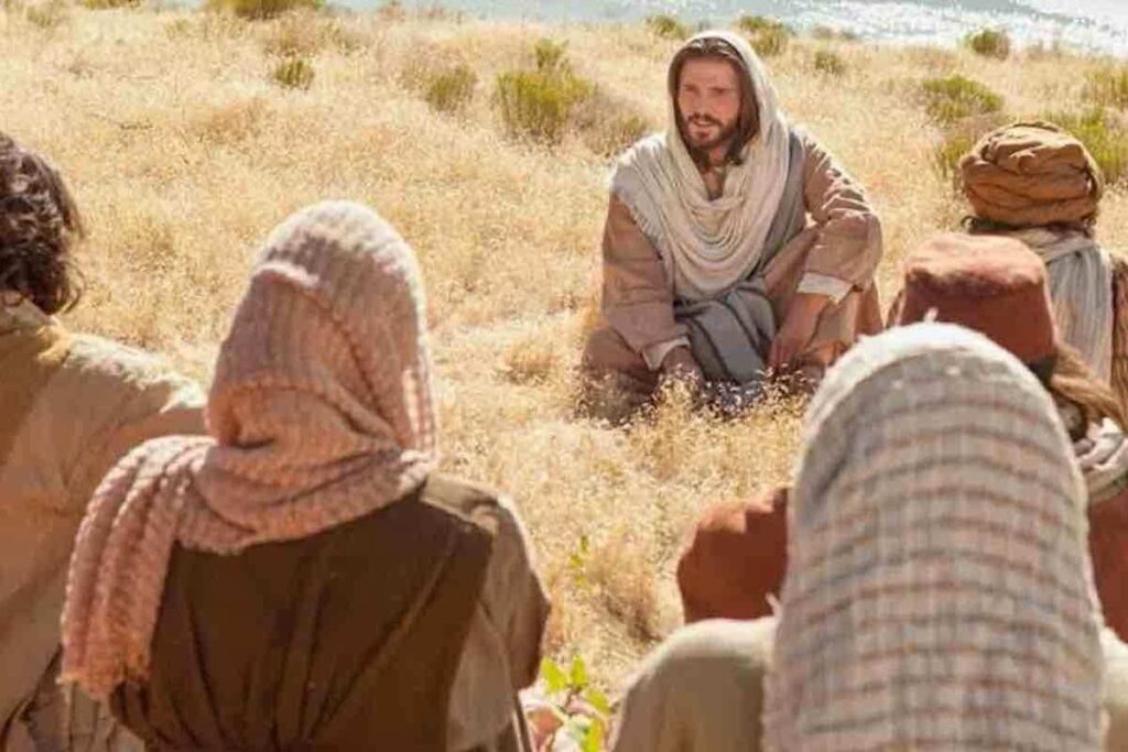 Gesù in un campo tra i discepoli